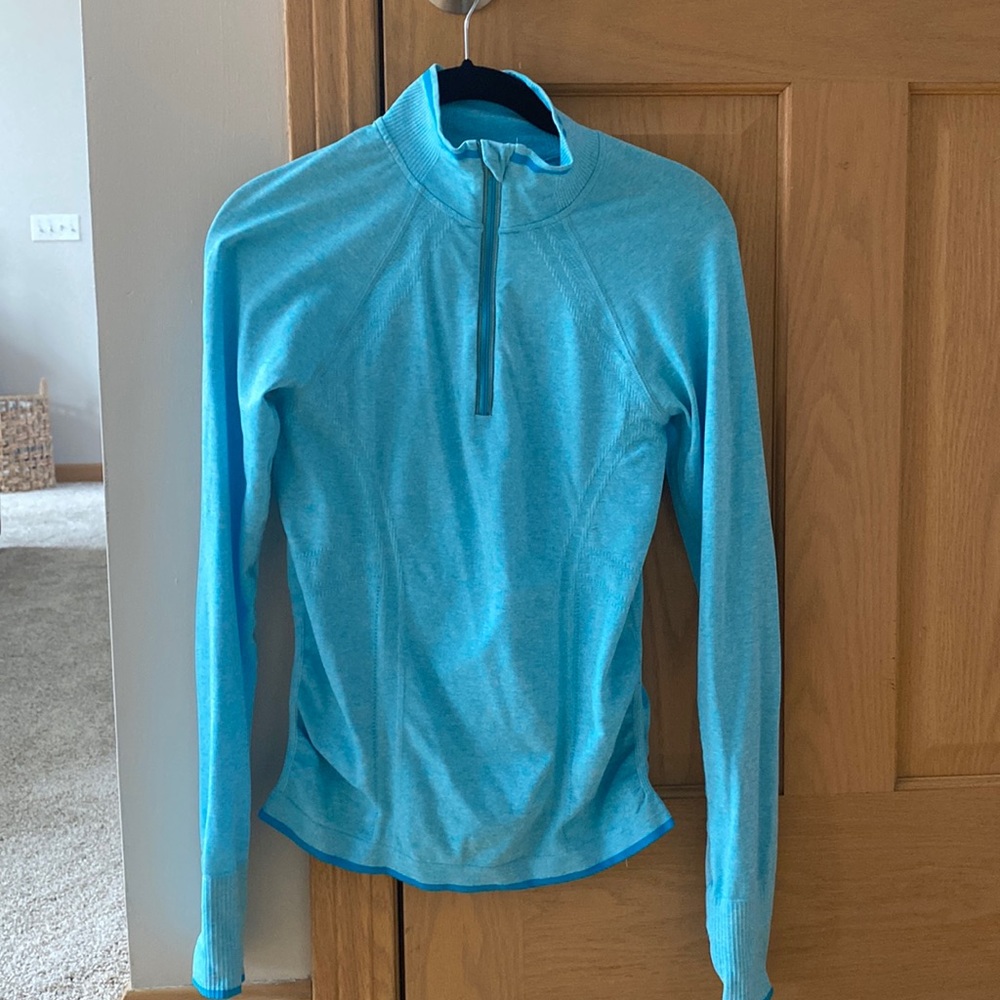 Athleta. Light blue half zip. XS